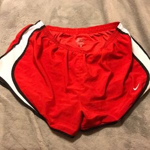 Red Nike shorts
